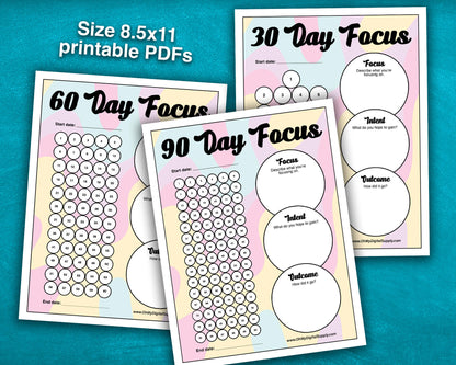 A 30, 60, and 90 Day Focus Worksheet for tracking daily goals, challenges, habits, and more. Each sheet has a space for writing down your focus, intent, and outcome. There are circles you can fill in or cross off each day to indicate you completed your daily focus goal.