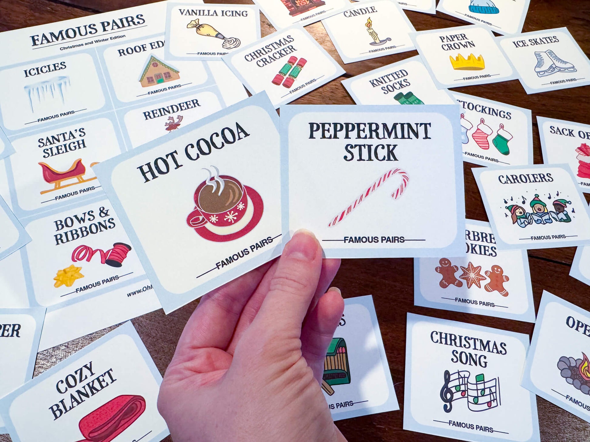 Famous Pairs Christmas & Winter group team building game and icebreaker activity. A digital PDF download containing instructions to play the game and Famous Pairs cards.